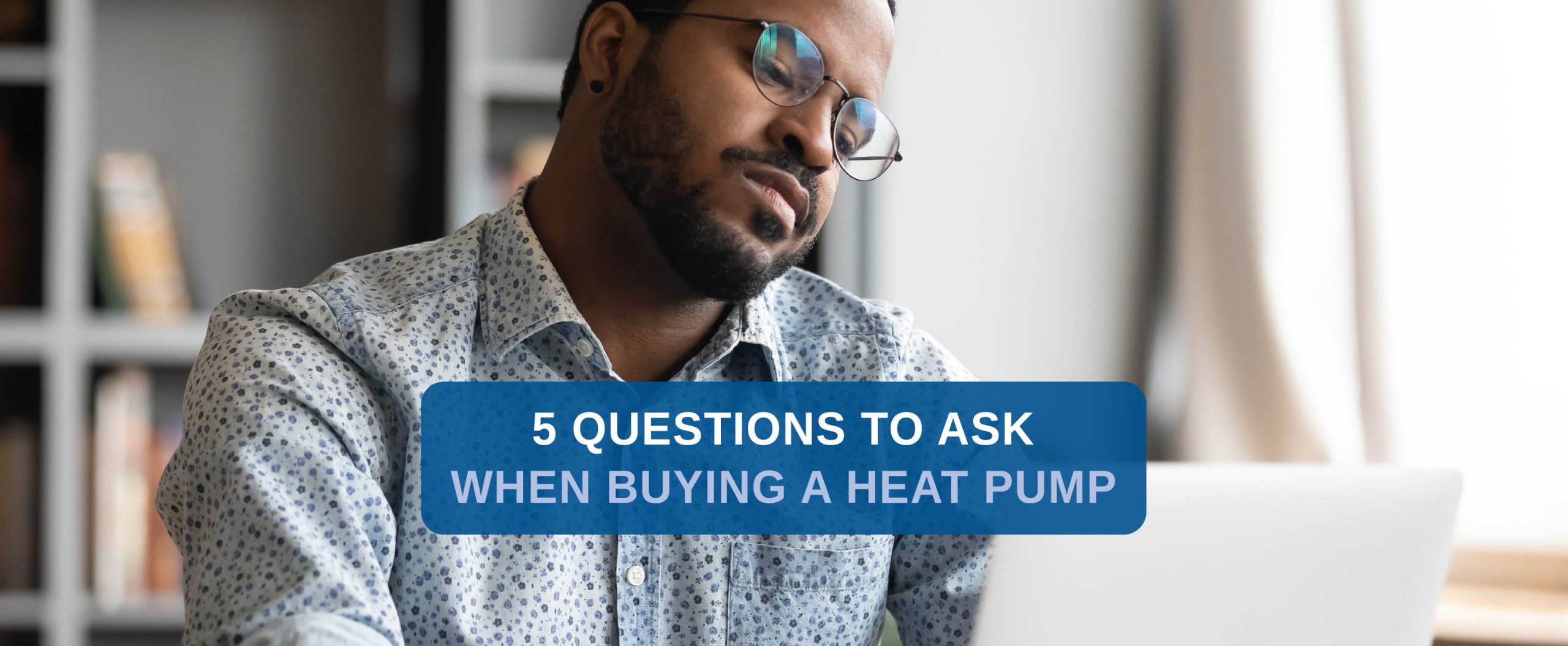man thinking about buying a heat pump